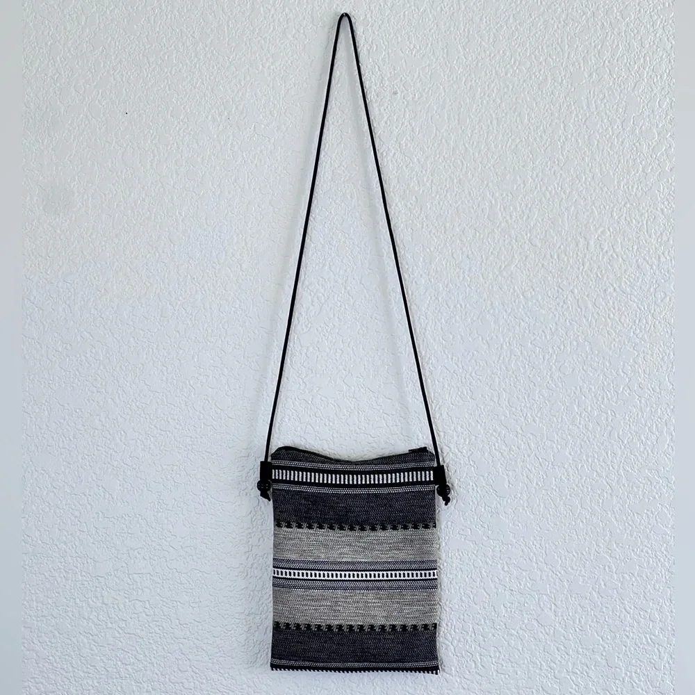 Like new black and white woven crossbody bag small